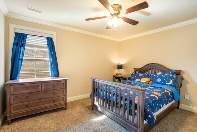 bedroom featuring baseboards, visible vents, and crown molding