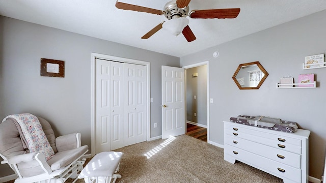 sitting room with ceiling fan, baseboards, and carpet flooring