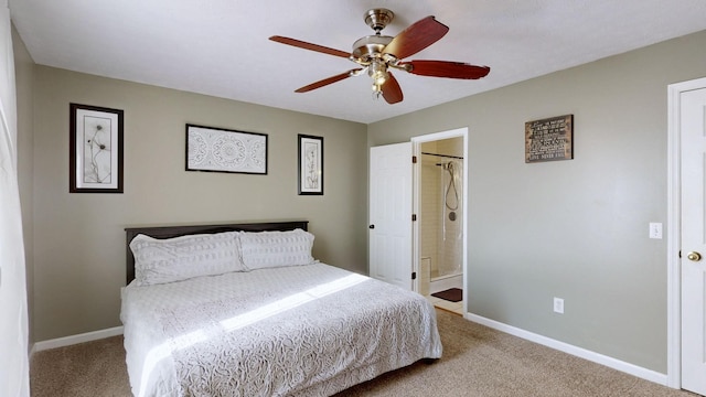 carpeted bedroom with a ceiling fan and baseboards