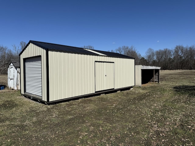 view of outdoor structure featuring an outdoor structure