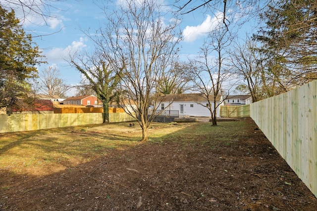 view of yard featuring a fenced backyard