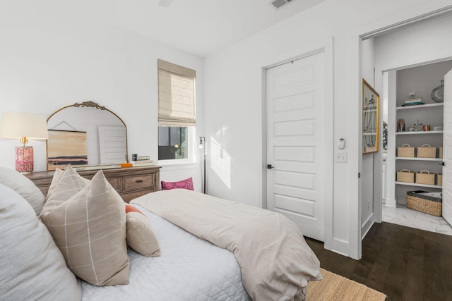 bedroom featuring wood finished floors