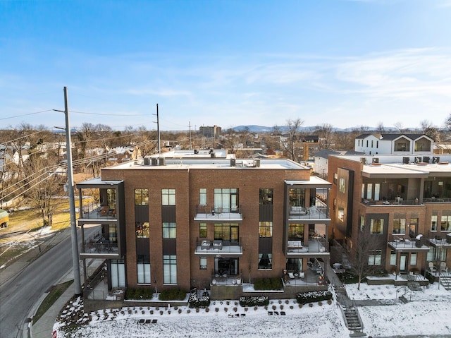 view of snow covered property