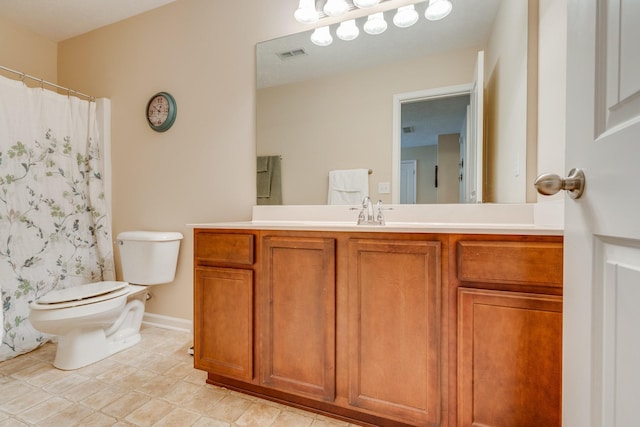 bathroom with visible vents, a shower with shower curtain, toilet, vanity, and baseboards