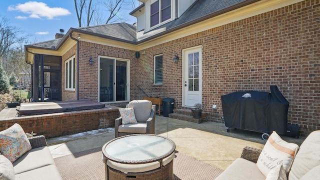 view of patio / terrace featuring entry steps, area for grilling, and an outdoor hangout area