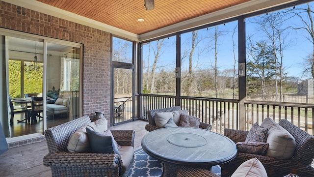 sunroom with wood ceiling