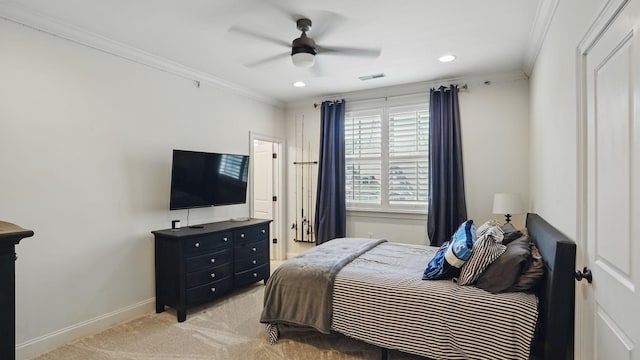 bedroom featuring ornamental molding, light colored carpet, visible vents, and baseboards