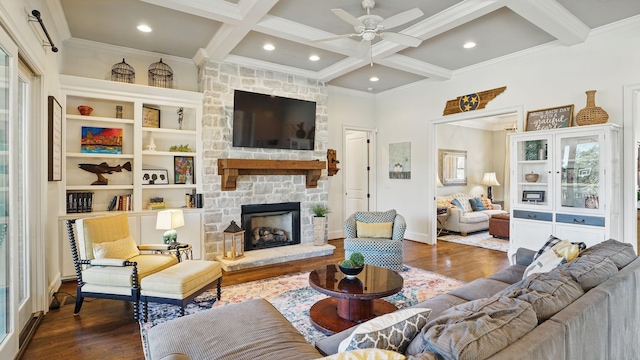 living area with coffered ceiling, wood finished floors, and beamed ceiling