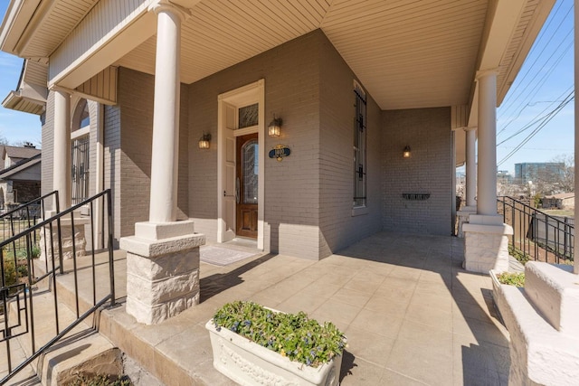 view of patio featuring fence