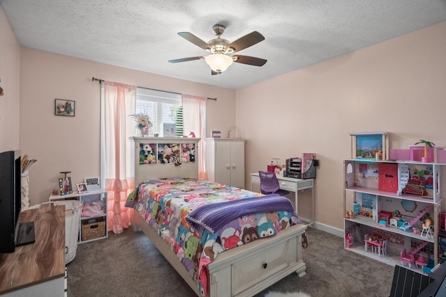 bedroom with a ceiling fan, carpet, a textured ceiling, and baseboards