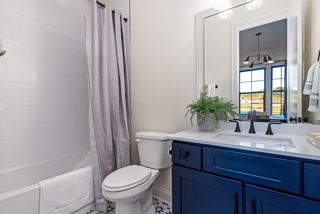 full bath featuring toilet, shower / bath combo, and vanity