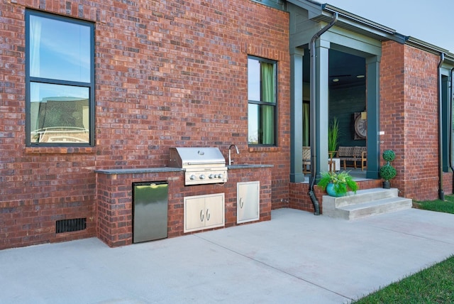 view of patio / terrace with area for grilling