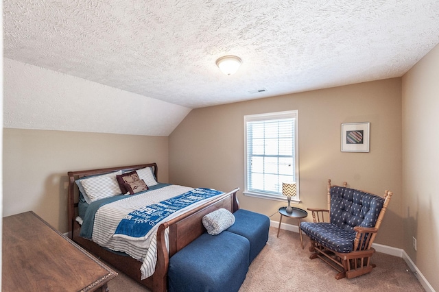 bedroom featuring lofted ceiling, carpet floors, visible vents, and baseboards