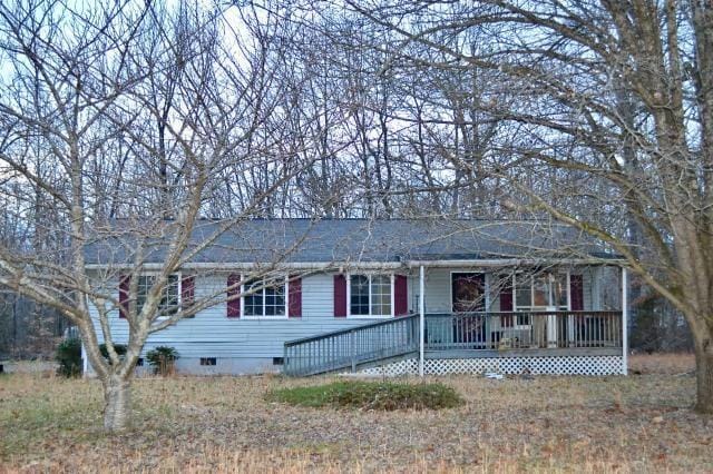 ranch-style house featuring crawl space and covered porch