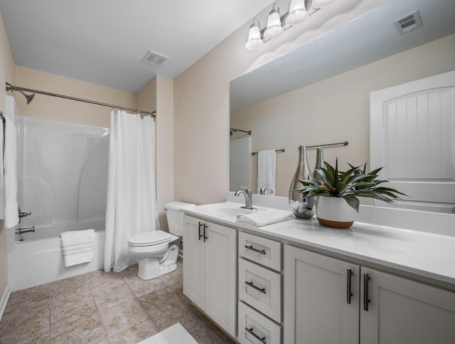 full bathroom with visible vents, vanity, toilet, and shower / bath combo with shower curtain