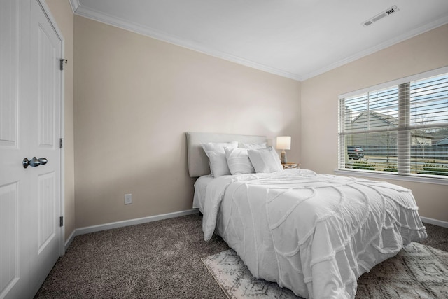 bedroom featuring ornamental molding, visible vents, and light carpet