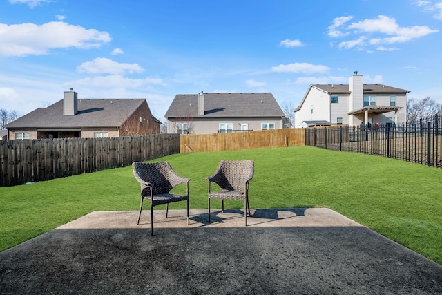 view of yard featuring a fenced backyard and a patio