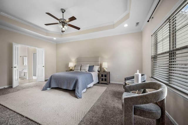 bedroom with visible vents, baseboards, ornamental molding, carpet, and a raised ceiling