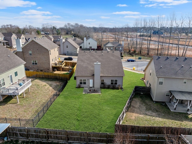 birds eye view of property with a residential view