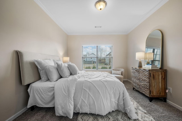 carpeted bedroom featuring crown molding, visible vents, and baseboards