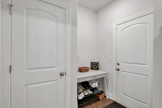 mudroom featuring dark wood-style floors