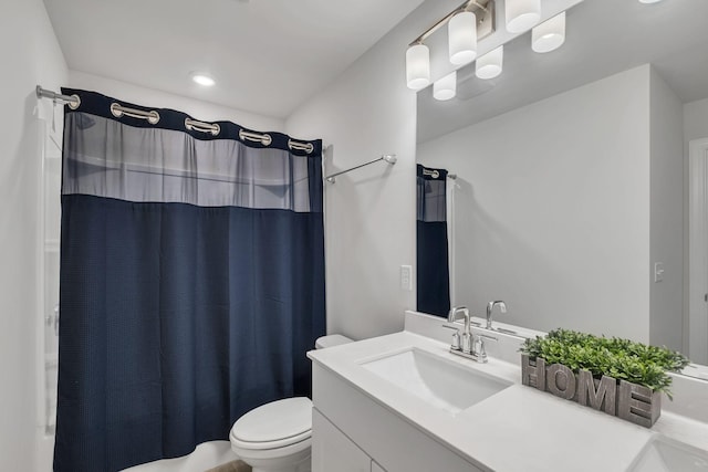 full bath featuring toilet, shower / bathtub combination with curtain, and vanity