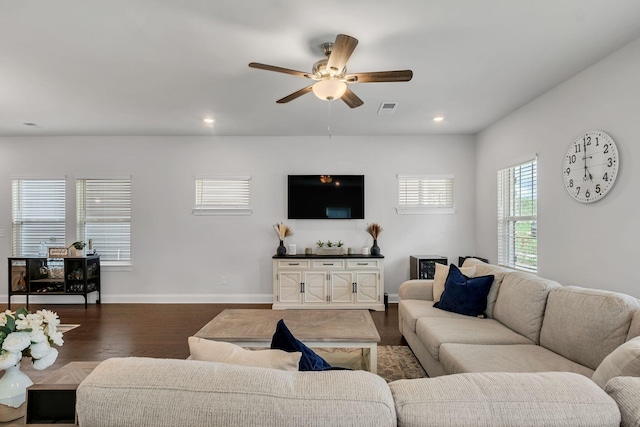 living room with ceiling fan, recessed lighting, wood finished floors, visible vents, and baseboards