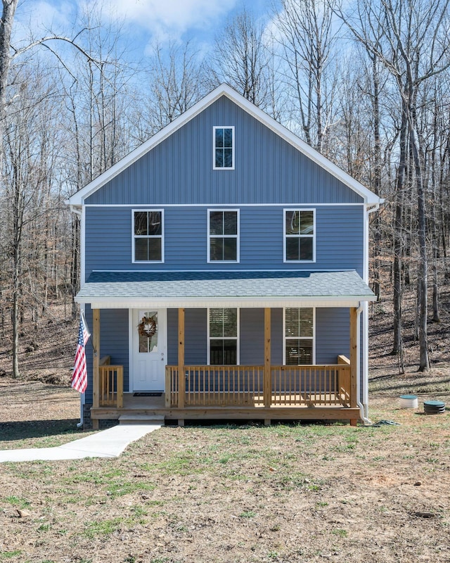 view of front of house featuring a porch and roof with shingles