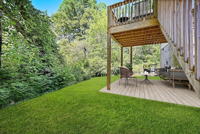 view of yard with a wooden deck