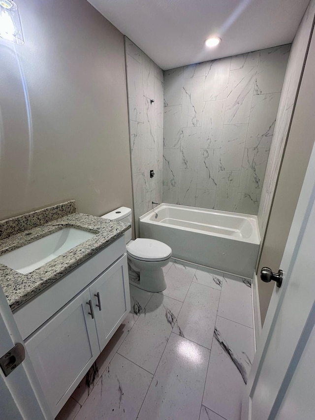 bathroom featuring bathtub / shower combination, toilet, recessed lighting, vanity, and marble finish floor