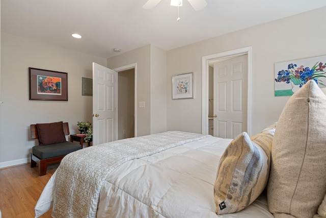 bedroom featuring light wood-type flooring, ceiling fan, baseboards, and recessed lighting