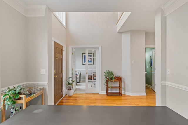 entryway with wood finished floors