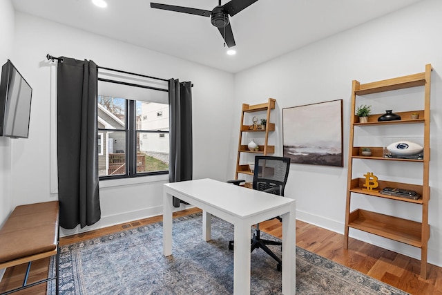 home office featuring ceiling fan, baseboards, wood finished floors, and recessed lighting