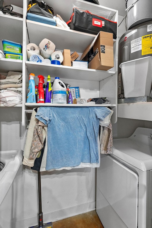 storage room featuring washer / clothes dryer