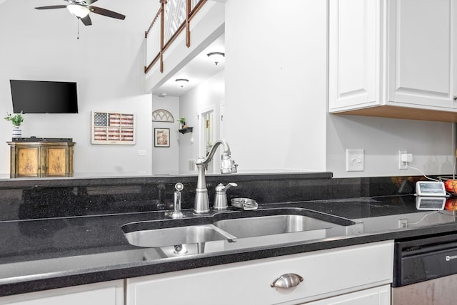 kitchen featuring a sink, a ceiling fan, white cabinets, and dishwasher