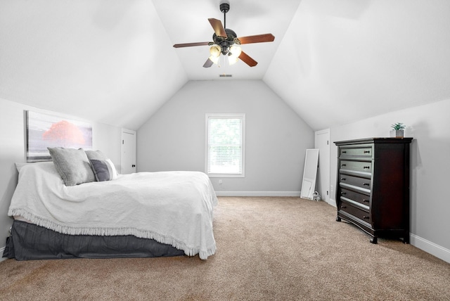 bedroom featuring carpet, lofted ceiling, visible vents, a ceiling fan, and baseboards