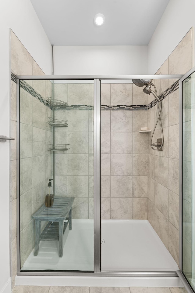 full bath featuring a stall shower