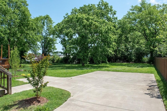 view of patio featuring fence