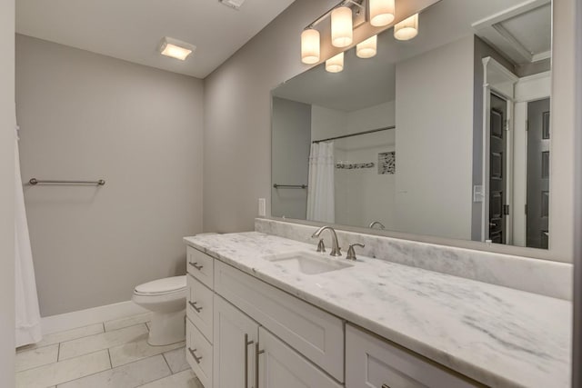 bathroom featuring baseboards, a shower with shower curtain, toilet, tile patterned floors, and vanity