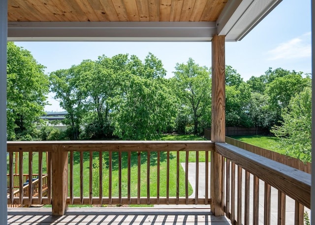 deck featuring a lawn