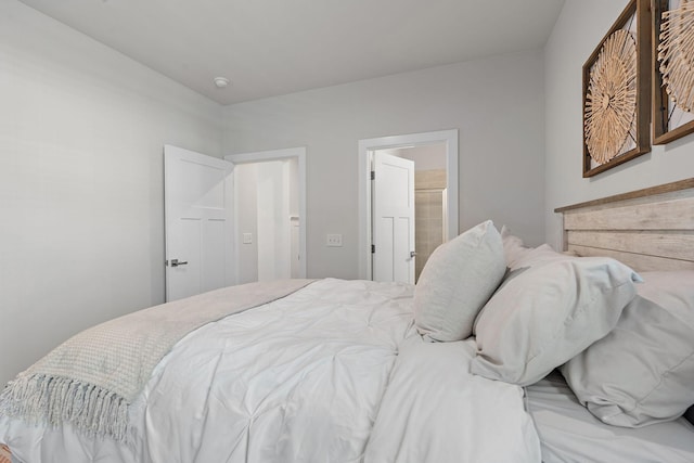 bedroom featuring connected bathroom