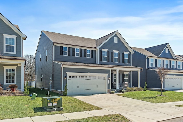 view of front of home featuring covered porch, driveway, a front lawn, and a garage