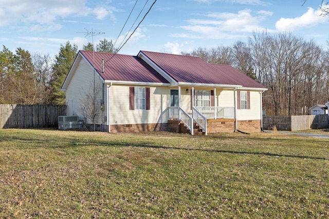 ranch-style house with crawl space, fence, a front lawn, and metal roof