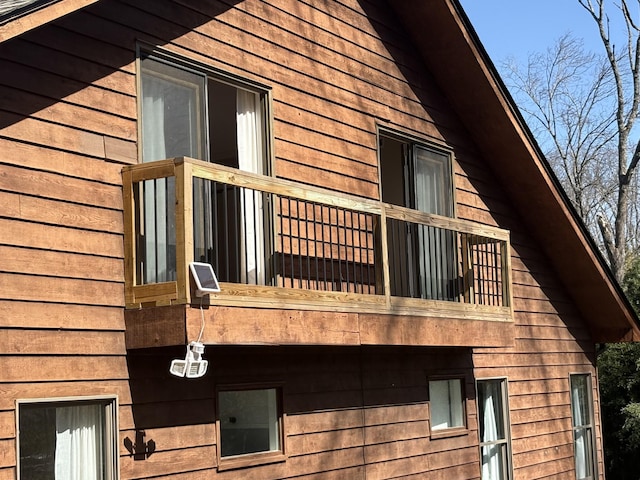 view of home's exterior featuring a balcony