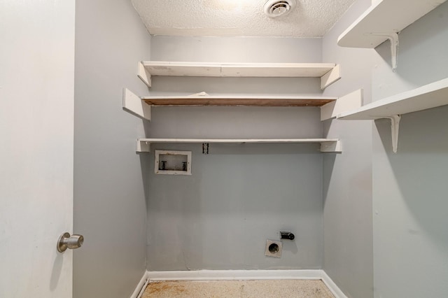 laundry area with laundry area, baseboards, visible vents, hookup for an electric dryer, and washer hookup