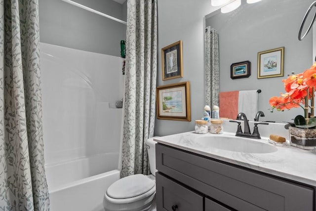 full bath with toilet, shower / bathtub combination with curtain, and vanity