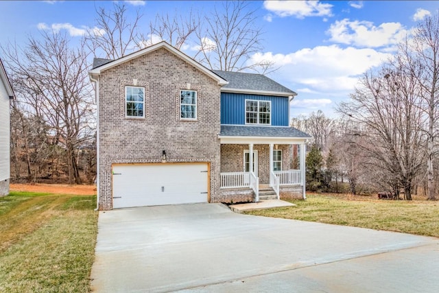 traditional home with a porch, a garage, brick siding, concrete driveway, and a front yard