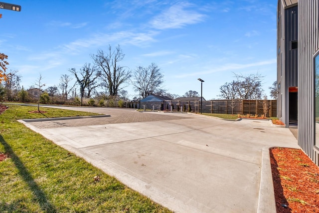 view of patio / terrace featuring fence