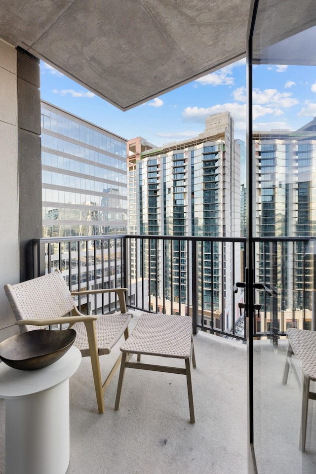 balcony featuring a city view