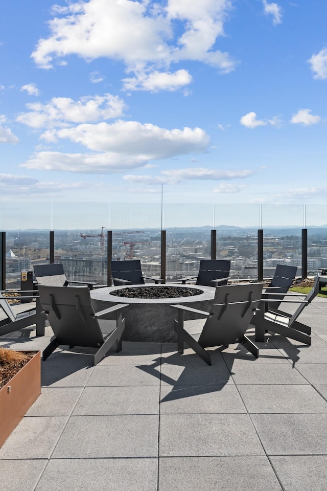 view of patio with a fire pit